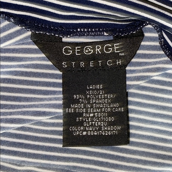 This is a super dressy navy and white blouse! - Picture 2 of 2